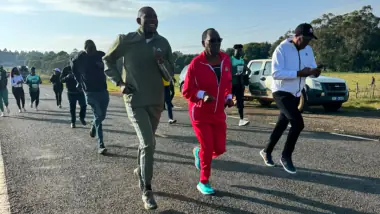 Dr. Chris Kiptoo running at the front of the pack at the 2026 Kaptagat Forest Marathon