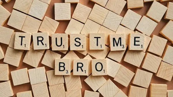Scrabble letters spelling out trust me bro representing gym myths and misinformation