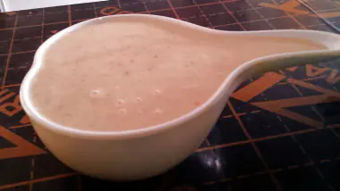 A calabash bowl of uji power served at a Kenyan restaurant